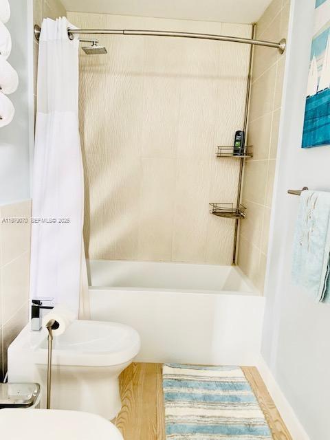 619 Meridian Avenue, Unit 4 Miami Beach, FL 33139 - Photo 25 of 30 a bathroom with a bathtub and a shower