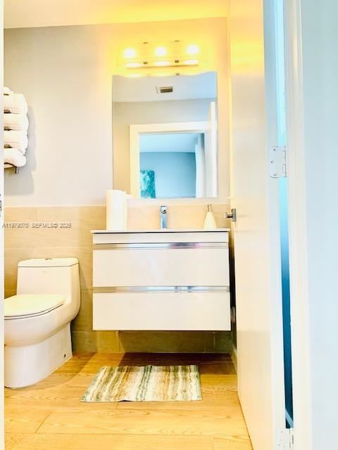 619 Meridian Avenue, Unit 4 Miami Beach, FL 33139 - Photo 29 of 30 a bathroom with a sink and a toilet