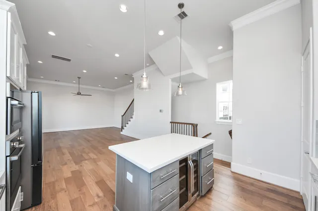 a kitchen that has a lot of cabinets in it