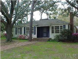 301 Payne Road Pensacola, FL 32507 - Photo 1 of 9 a front view of a house with garden
