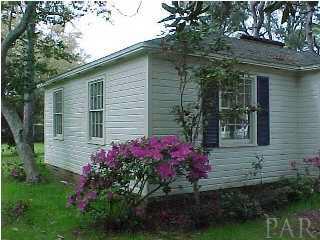 301 Payne Road Pensacola, FL 32507 - Photo 8 of 9 a view of a house with a yard