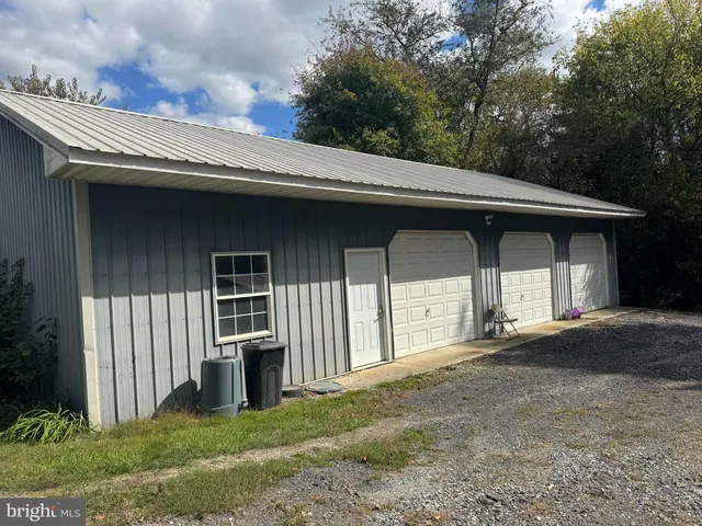 a front view of a house with yard