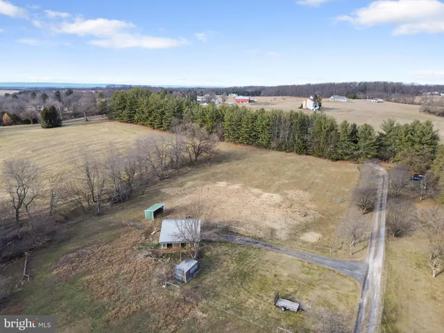 a view of a pathway with a lake