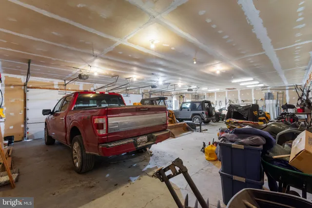 a view of a storage room with racks on the wall