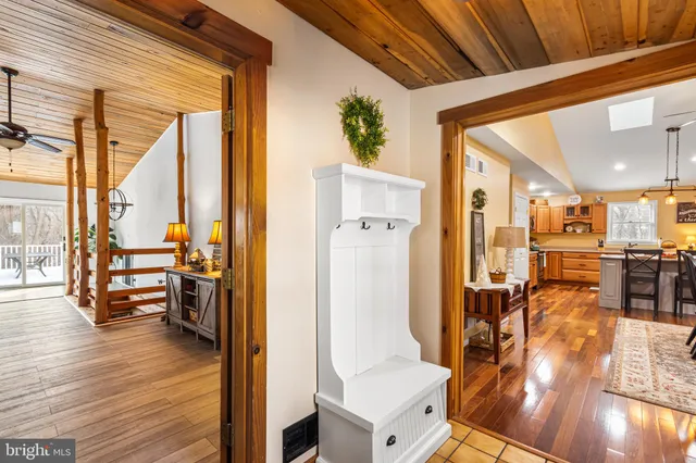 a view of a living room and dining room