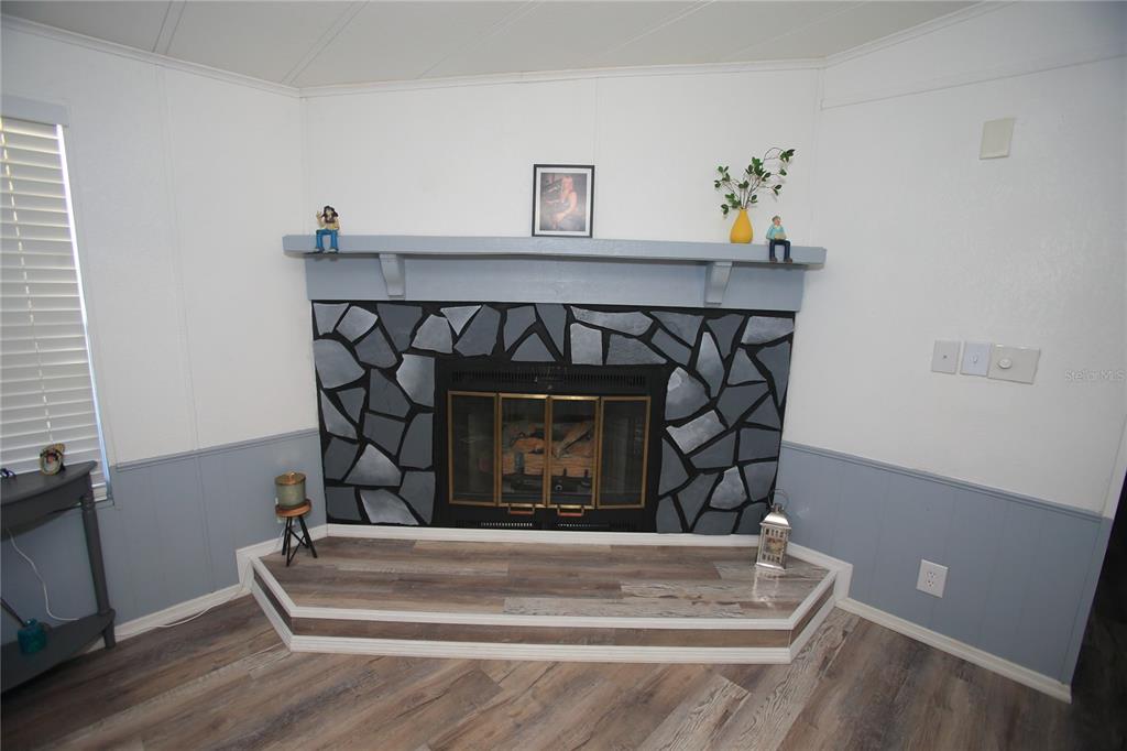 131 Southwest 76th Terrace Ocala, FL 34474 - Photo 13 of 27 a bedroom with a bed and a window