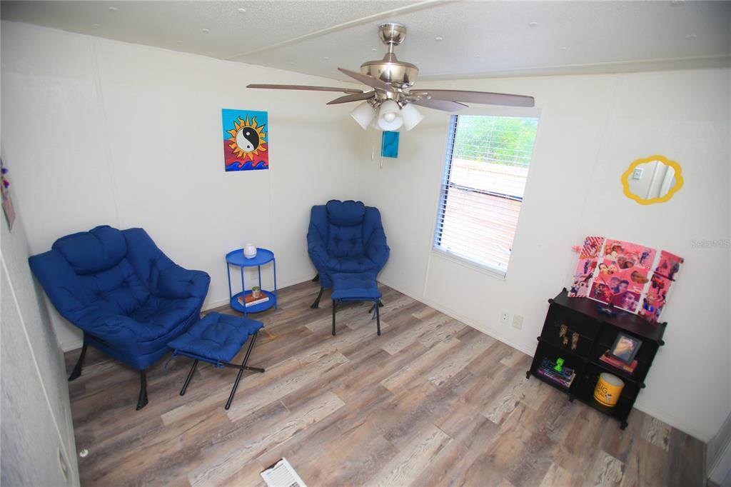 131 Southwest 76th Terrace Ocala, FL 34474 - Photo 24 of 27 a living room with furniture and a window