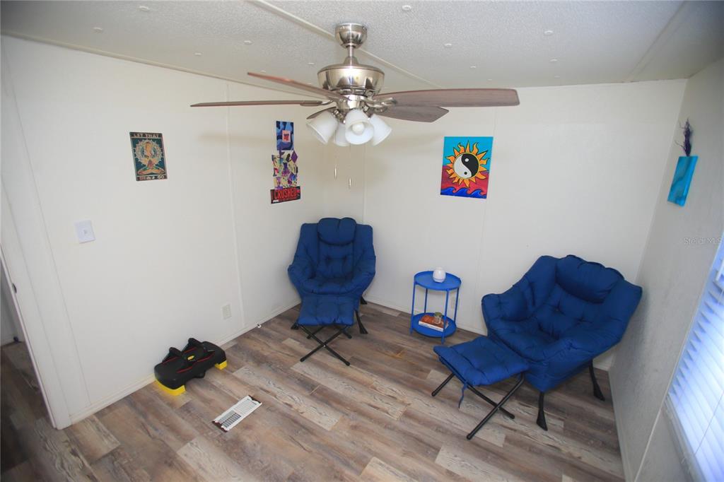 131 Southwest 76th Terrace Ocala, FL 34474 - Photo 25 of 27 a living room with furniture and a window