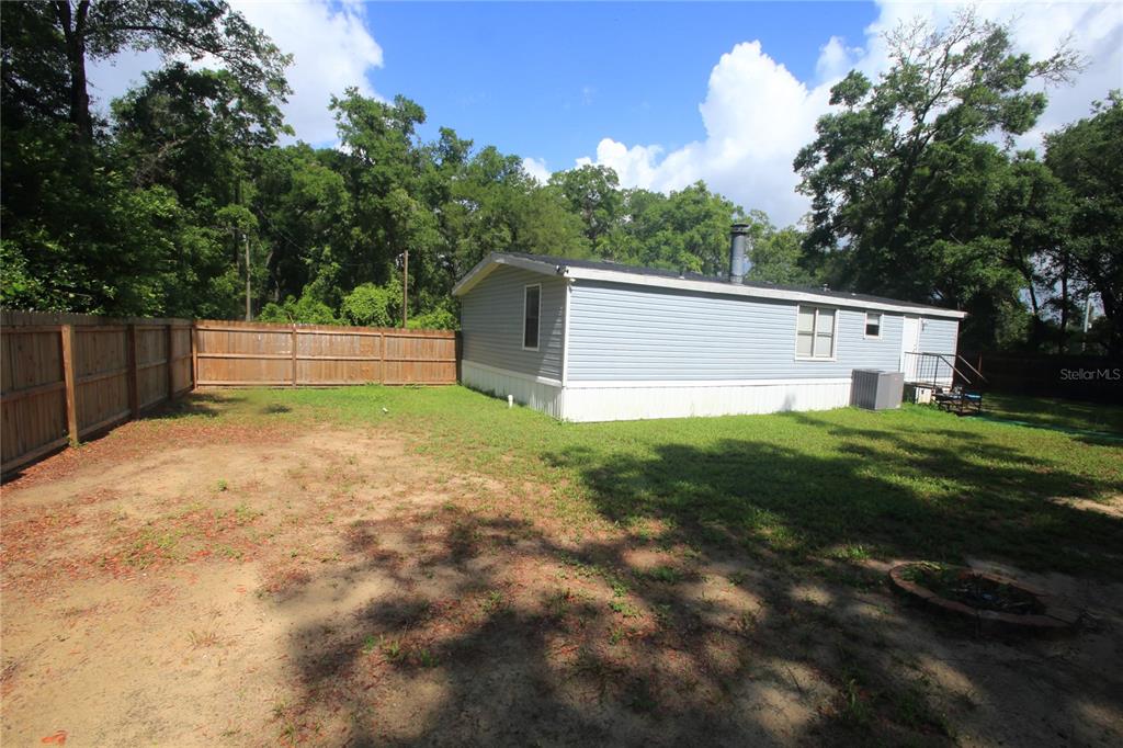 131 Southwest 76th Terrace Ocala, FL 34474 - Photo 3 of 27 a view of a backyard