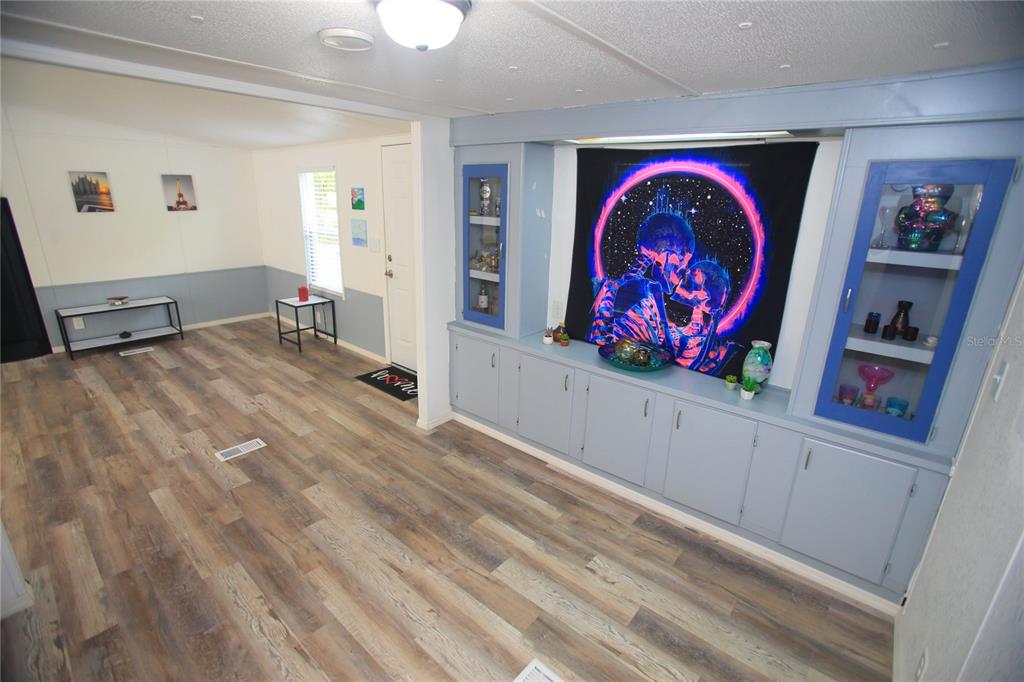 131 Southwest 76th Terrace Ocala, FL 34474 - Photo 9 of 27 a view of a livingroom with furniture and window