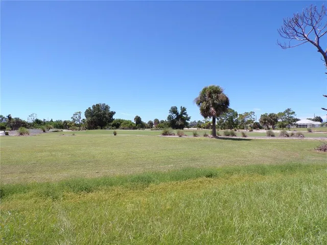 a view of a lake from a yard
