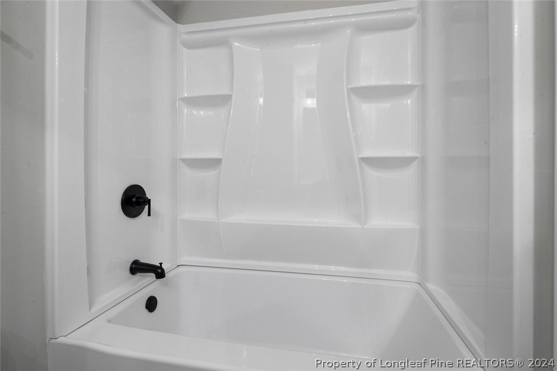 1604 Shaw Road Fayetteville, NC 28311 - Photo 16 of 30 a bathroom with a bathtub