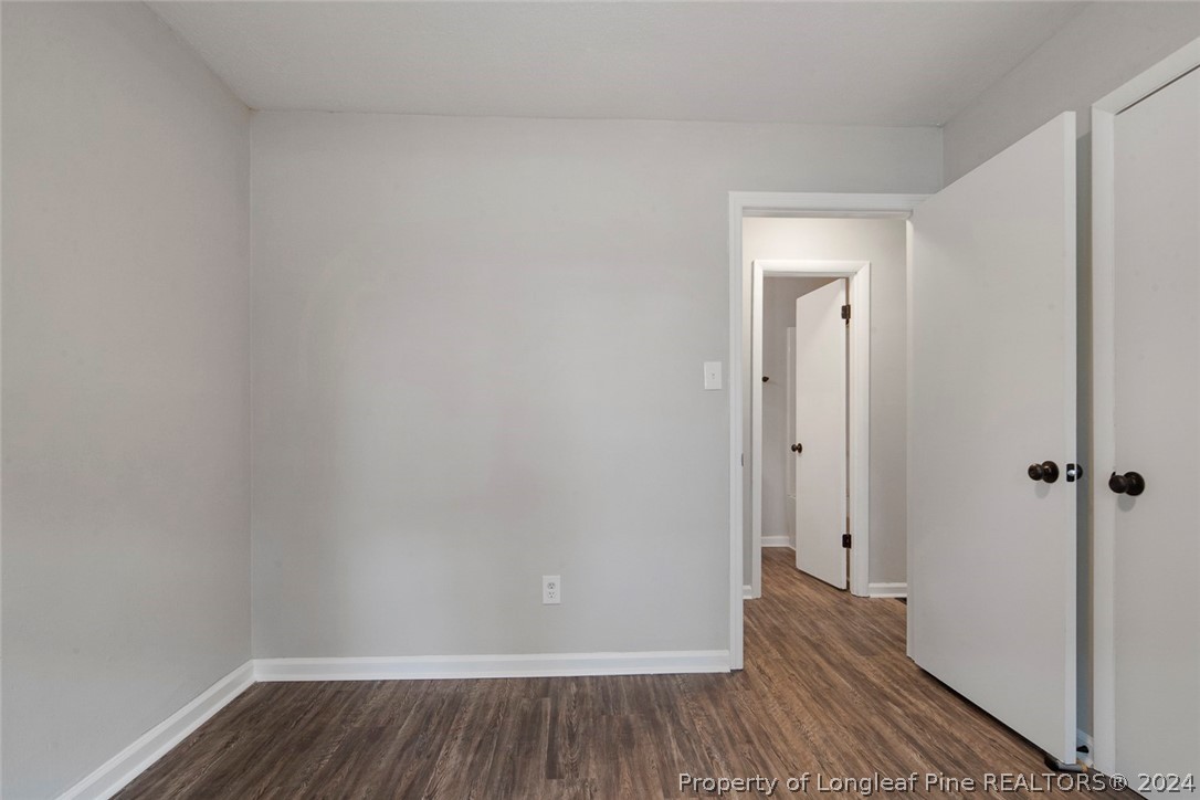 1604 Shaw Road Fayetteville, NC 28311 - Photo 18 of 30 a view of a hallway with wooden floor