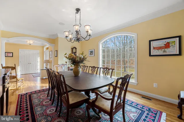 a kitchen with granite countertop a sink and cabinets
