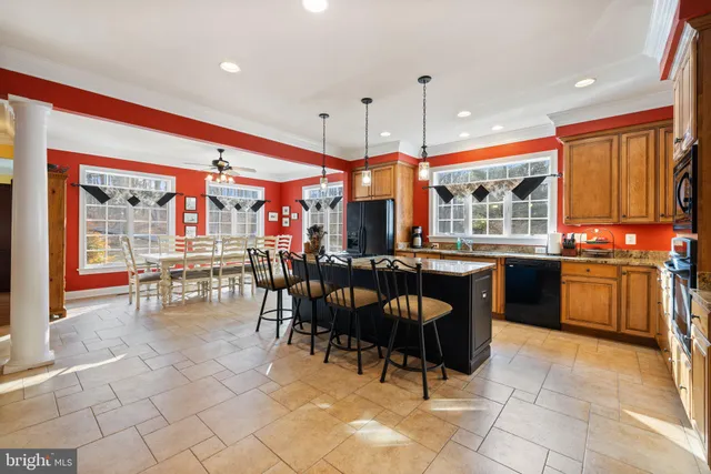a spacious bathroom with a sink a mirror and a shower