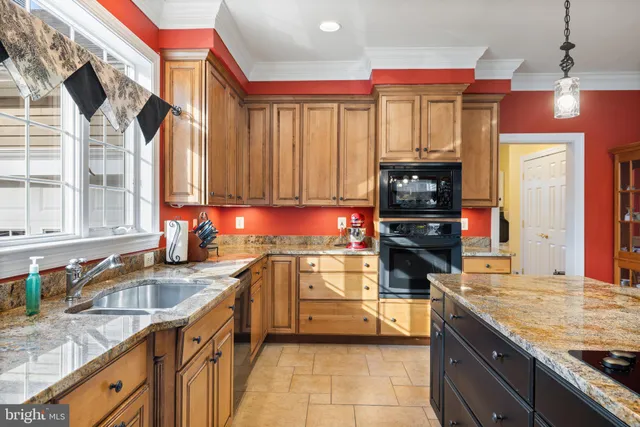 a bathroom with a sink mirror and toilet