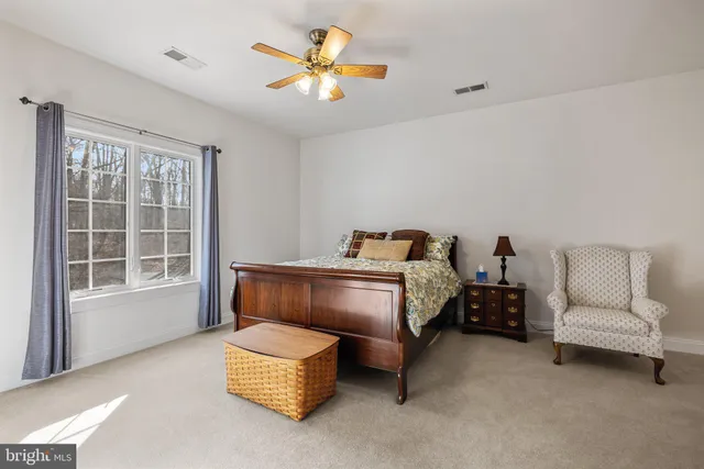 a view of an entryway with floor to ceiling windows