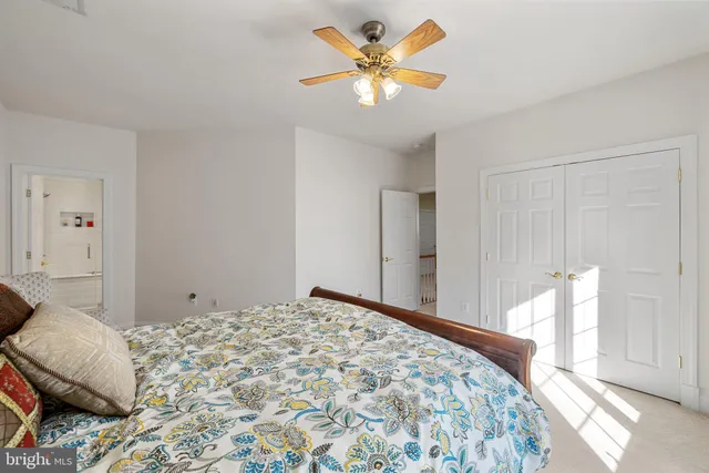 an aerial view of a house with swimming pool and garden