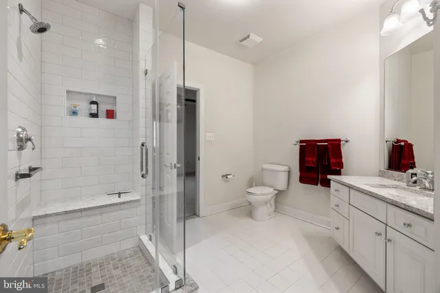 a front view of a house with swimming pool having outdoor seating