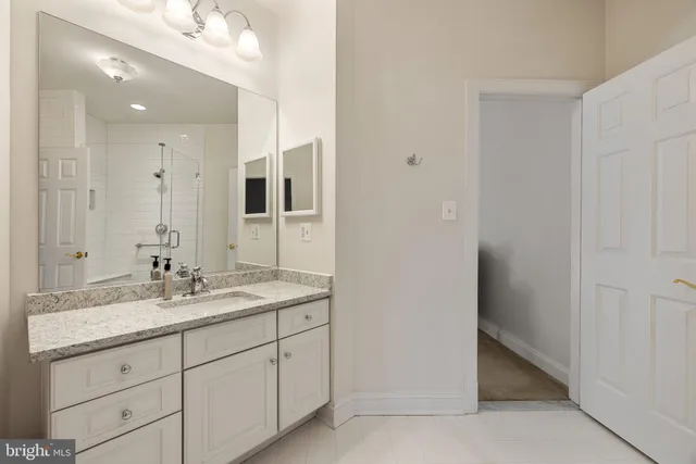 a front view of house with yard and trees