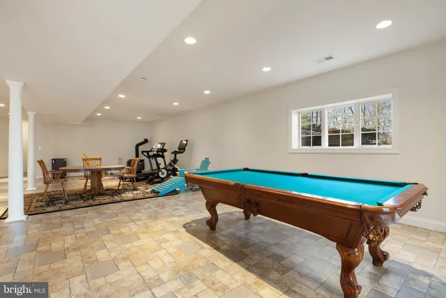 an aerial view of a house with a garden