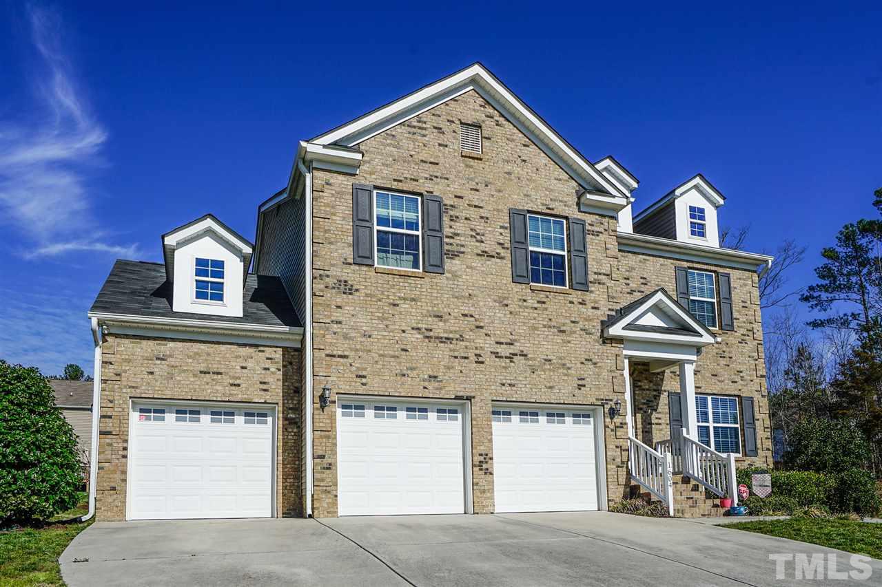All brick front and easy care vinyl on sides.