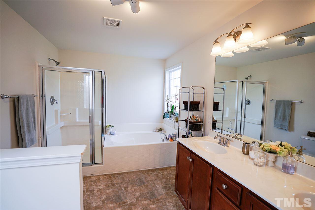 1604 Pattersons Mill Road Durham, NC 27703 - Photo 13 of 30 Large dual sink vanity, separate shower and soaking tub.