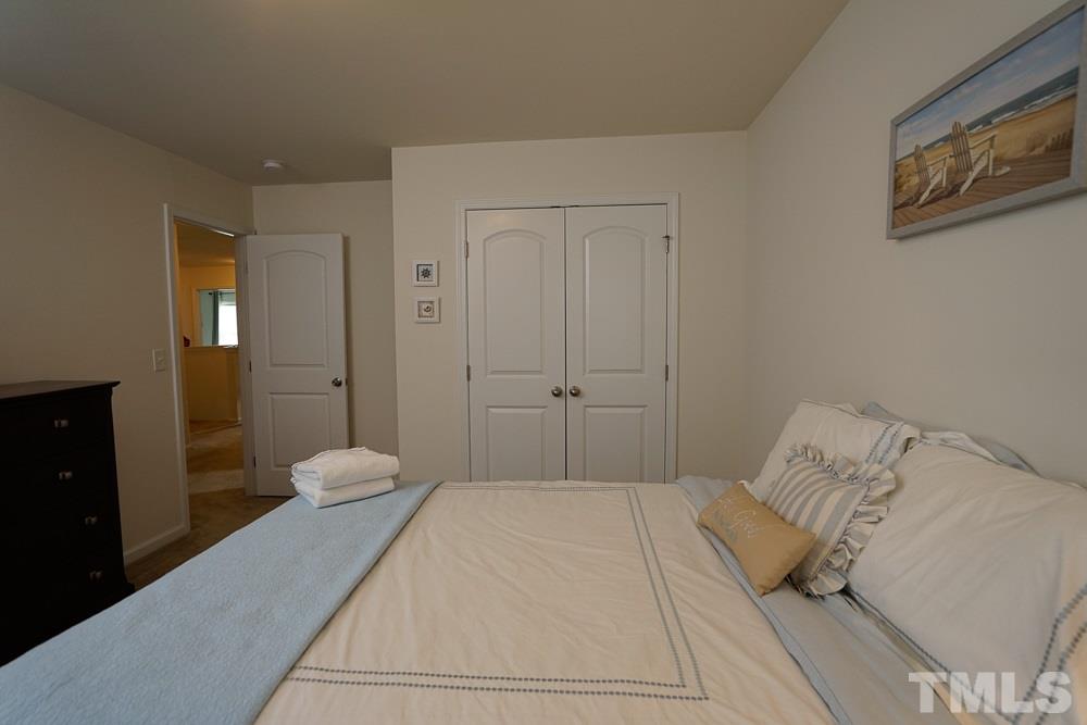 1604 Pattersons Mill Road Durham, NC 27703 - Photo 18 of 30 Larger than average secondary bedrooms feature generous closets.