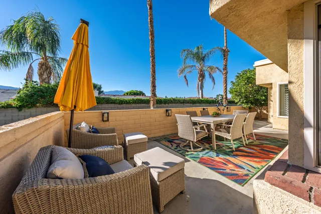 a outdoor living space with furniture and outdoor view