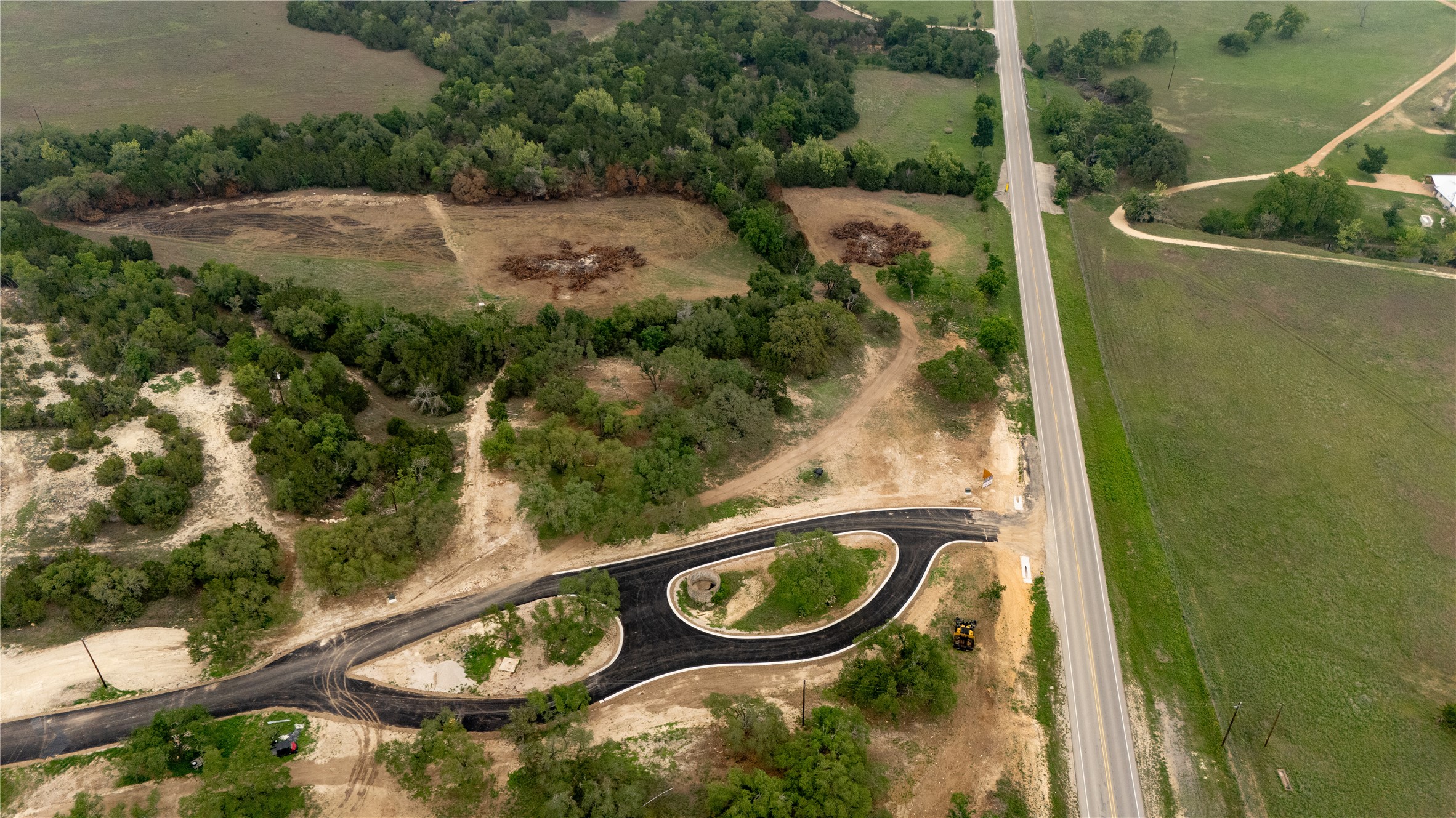 Lot 27 Ranch Road 165 Dripping Springs, TX 78620 - Photo 2 of 9 an aerial view of a house with swimming pool and patio