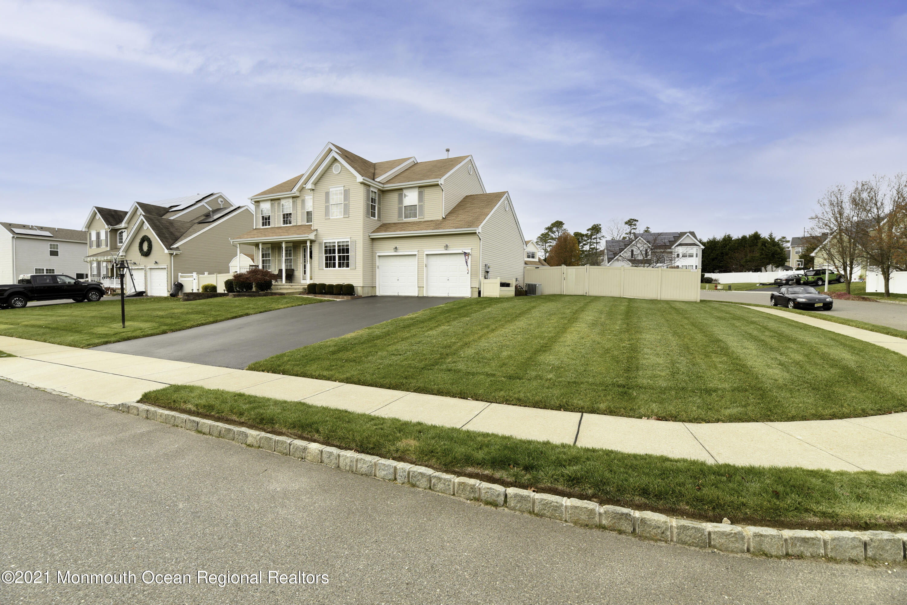 57 Mutineer Avenue Barnegat, NJ 08005 - Photo 2 of 89 a view of a house with a big yard and large trees