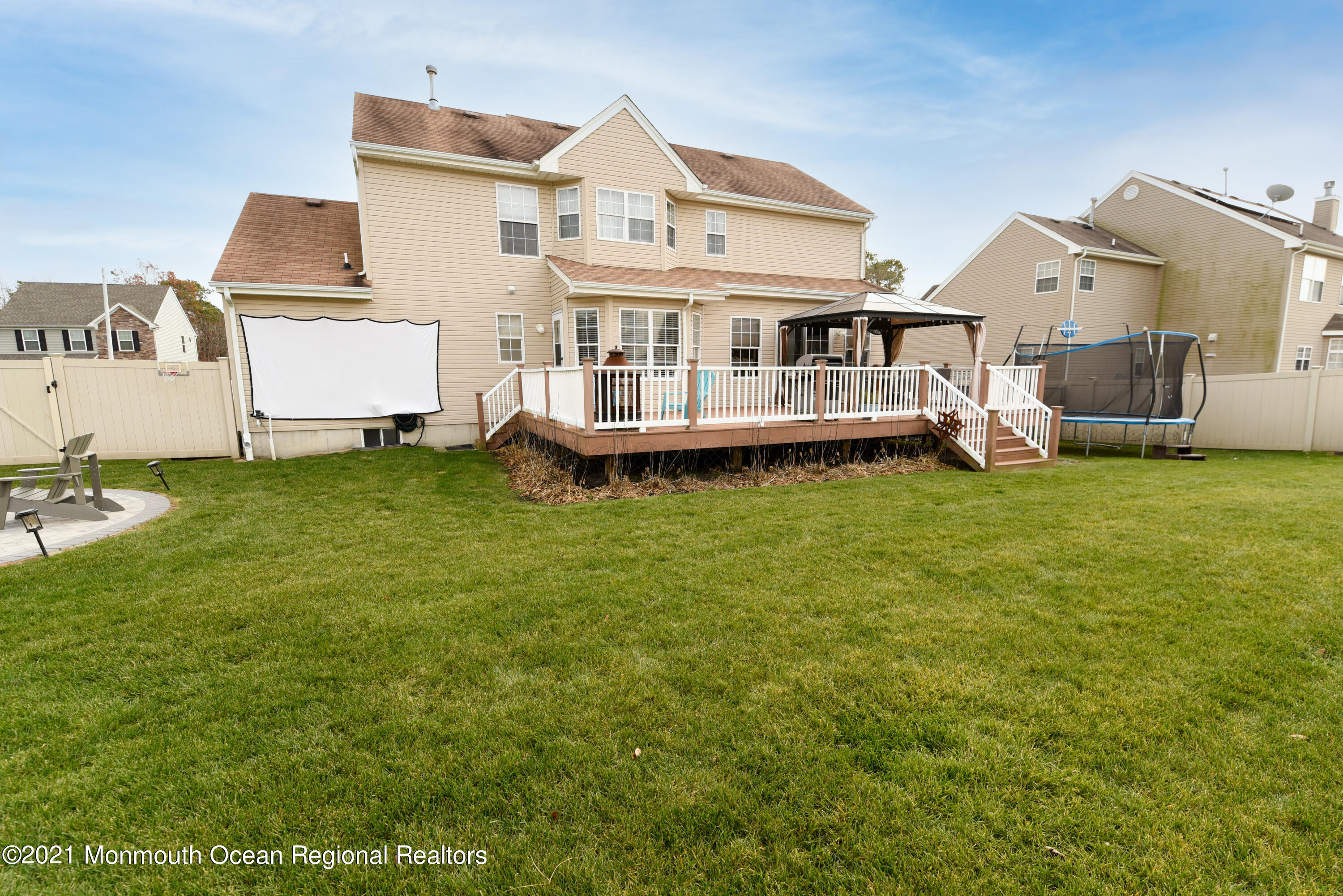 57 Mutineer Avenue Barnegat, NJ 08005 - Photo 11 of 89 a view of a house with a big yard and large trees