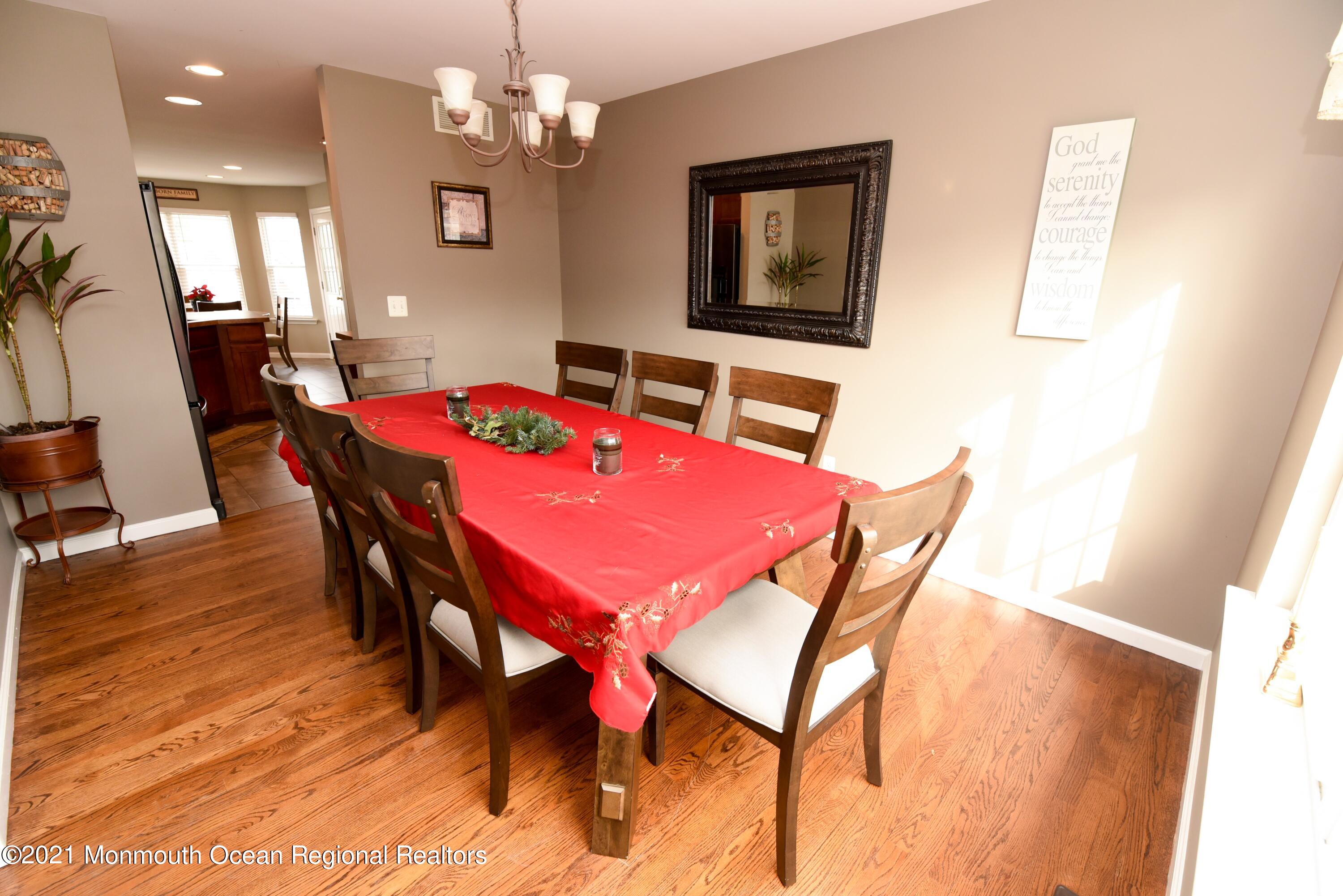 57 Mutineer Avenue Barnegat, NJ 08005 - Photo 19 of 89 a view of a dining room with furniture and wooden floor