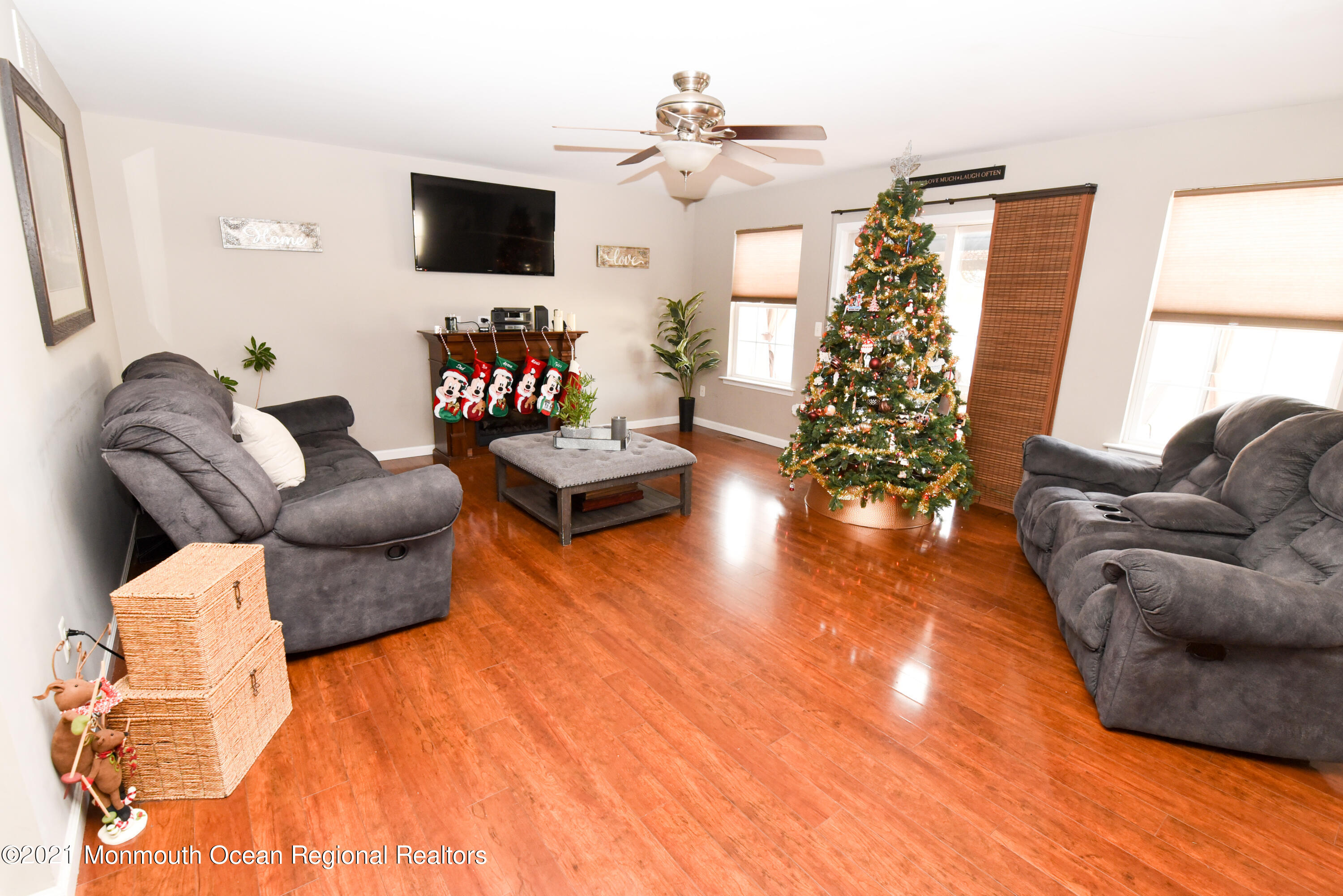 57 Mutineer Avenue Barnegat, NJ 08005 - Photo 32 of 89 a living room with furniture and a flat screen tv