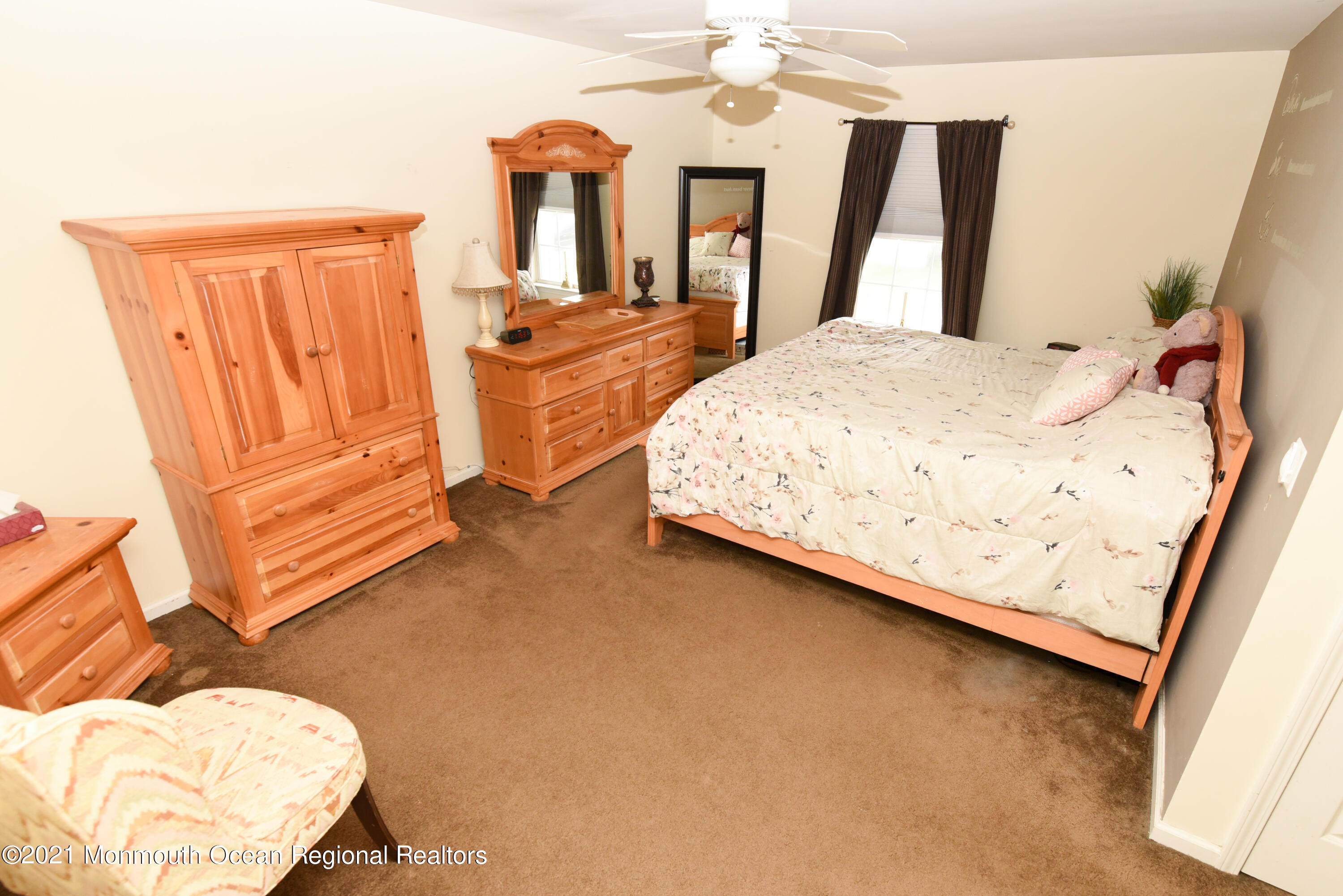57 Mutineer Avenue Barnegat, NJ 08005 - Photo 41 of 89 a bedroom with a bed and wooden floor