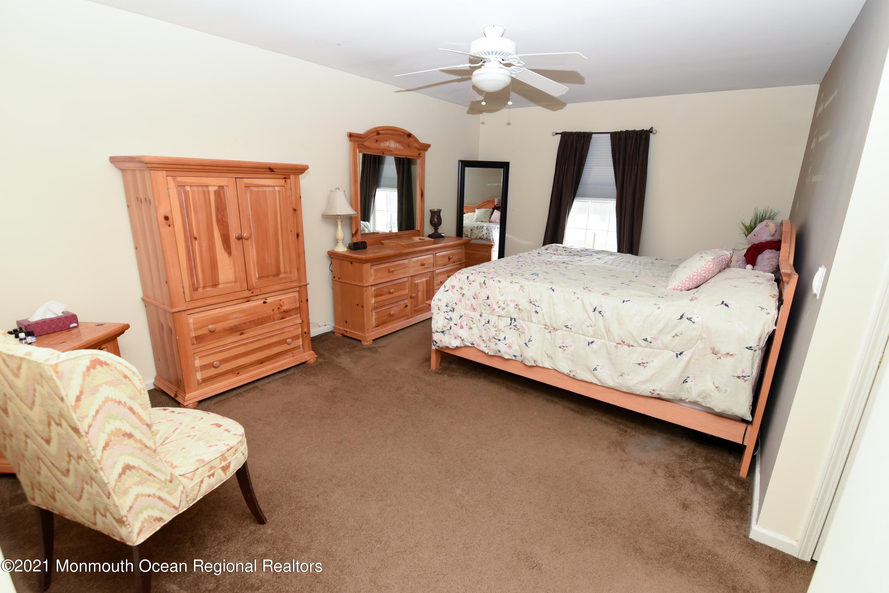57 Mutineer Avenue Barnegat, NJ 08005 - Photo 42 of 89 a bed room with a bed and a window