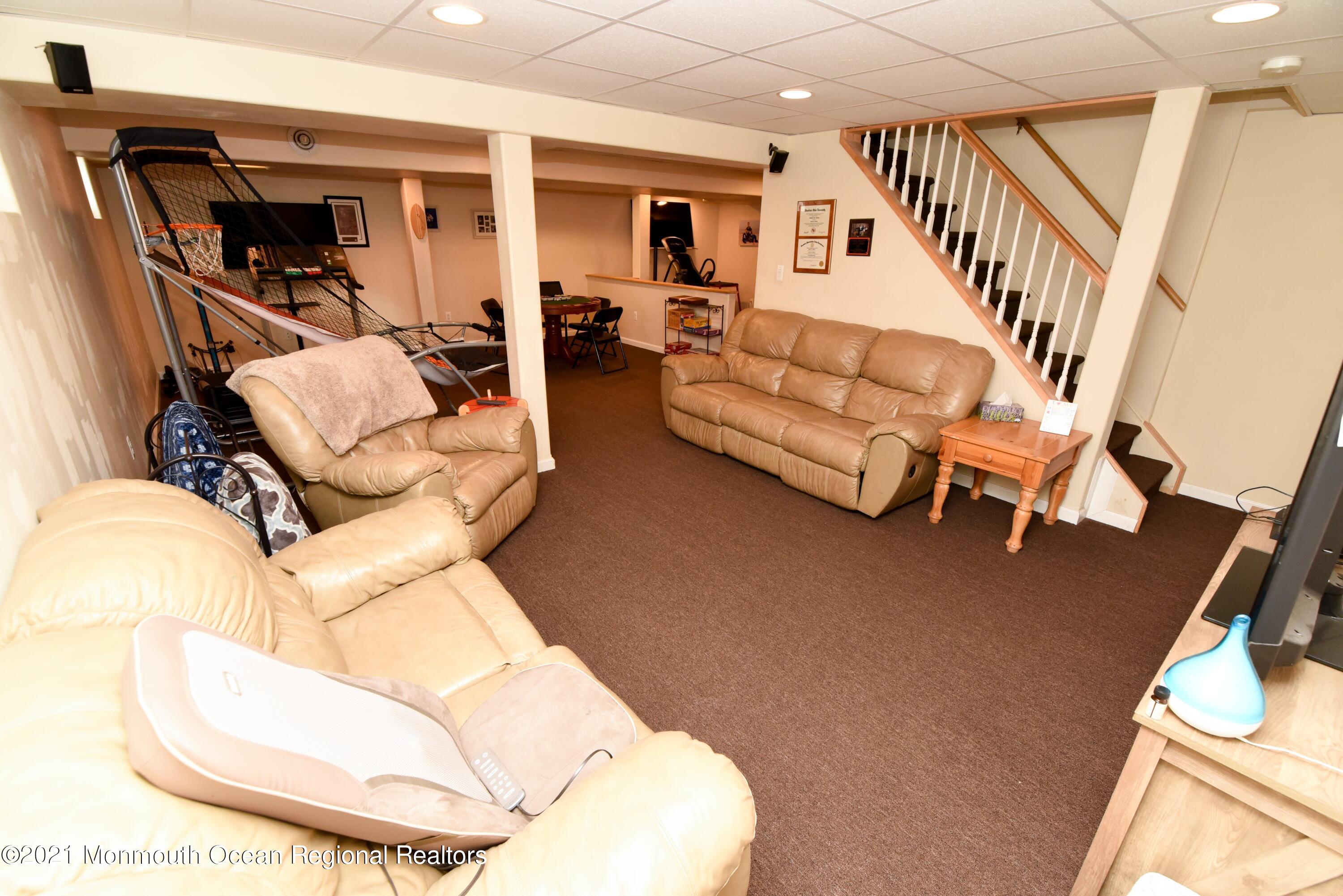 57 Mutineer Avenue Barnegat, NJ 08005 - Photo 58 of 89 a living room with furniture and a large window