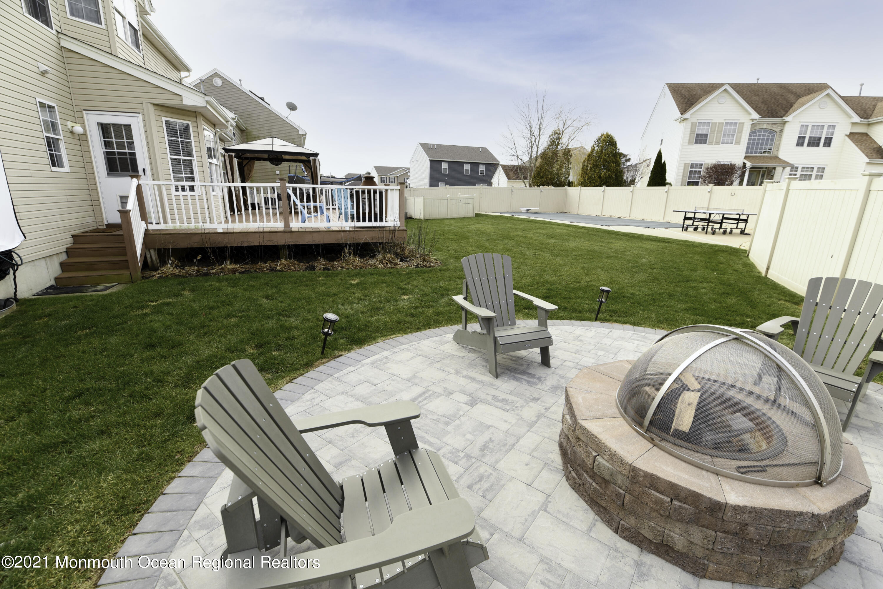 57 Mutineer Avenue Barnegat, NJ 08005 - Photo 82 of 89 a view of a house with backyard sitting area and furniture