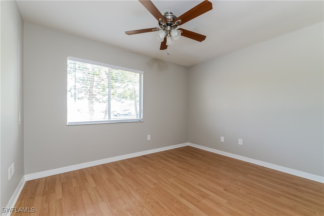 2809 Greendale Road North Port, FL 34287 - Photo 14 of 16 an empty room with a window and a fan