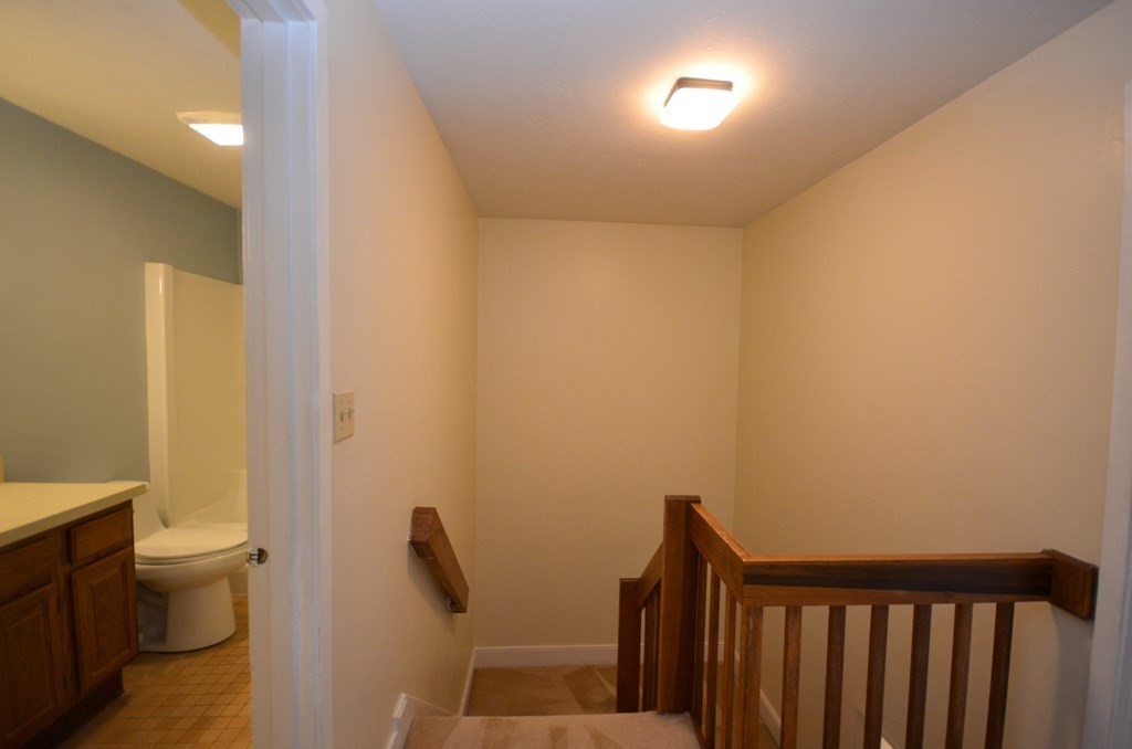19 Millers Way, Unit C Sutton, MA 01590 - Photo 21 of 37 a bathroom with a sink and a toilet