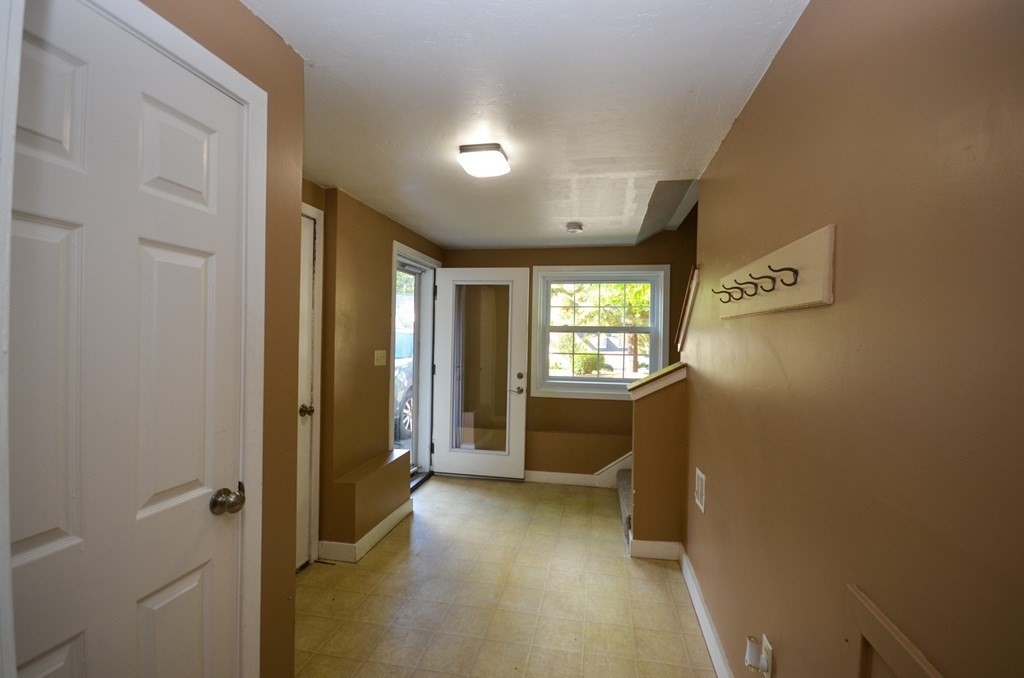 19 Millers Way, Unit C Sutton, MA 01590 - Photo 29 of 37 a view of a hallway with bathroom and a window
