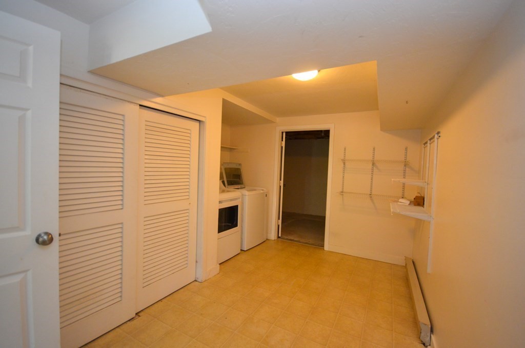 19 Millers Way, Unit C Sutton, MA 01590 - Photo 30 of 37 a view of a hallway with closet