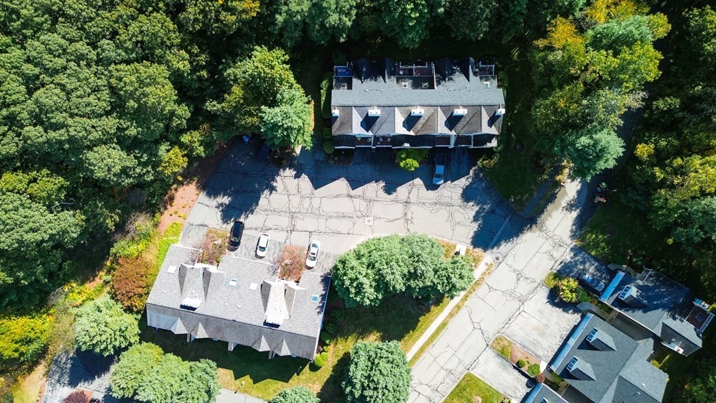 19 Millers Way, Unit C Sutton, MA 01590 - Photo 33 of 37 an aerial view of a house with a yard potted plants and large tree