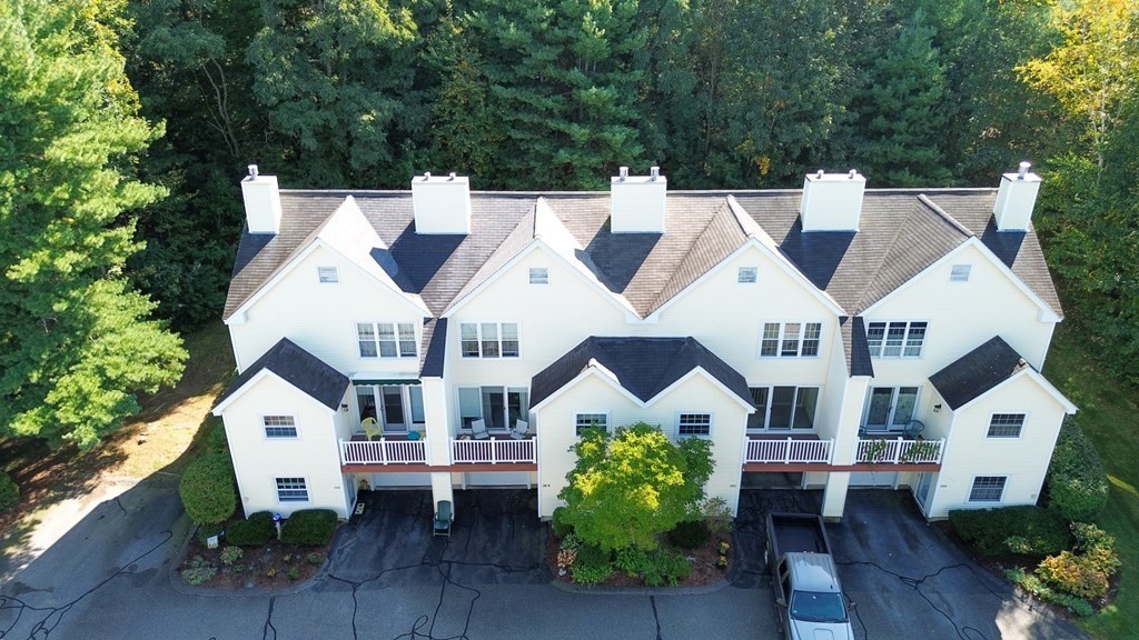 19 Millers Way, Unit C Sutton, MA 01590 - Photo 34 of 37 a front view of a house with a yard