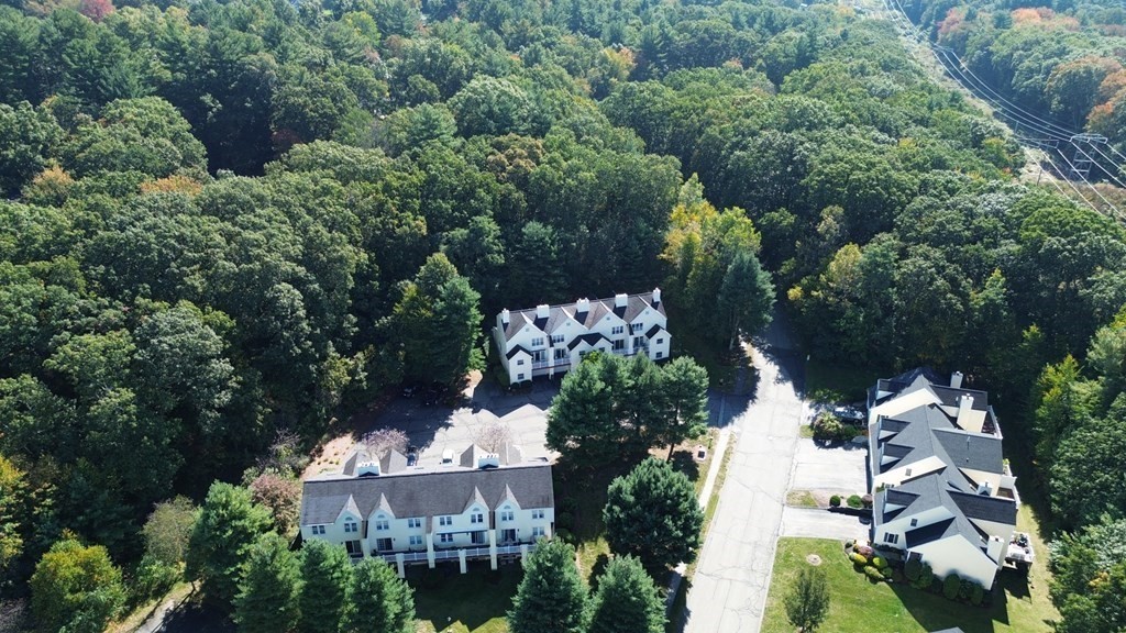 19 Millers Way, Unit C Sutton, MA 01590 - Photo 35 of 37 an aerial view of a house with a yard and lake view