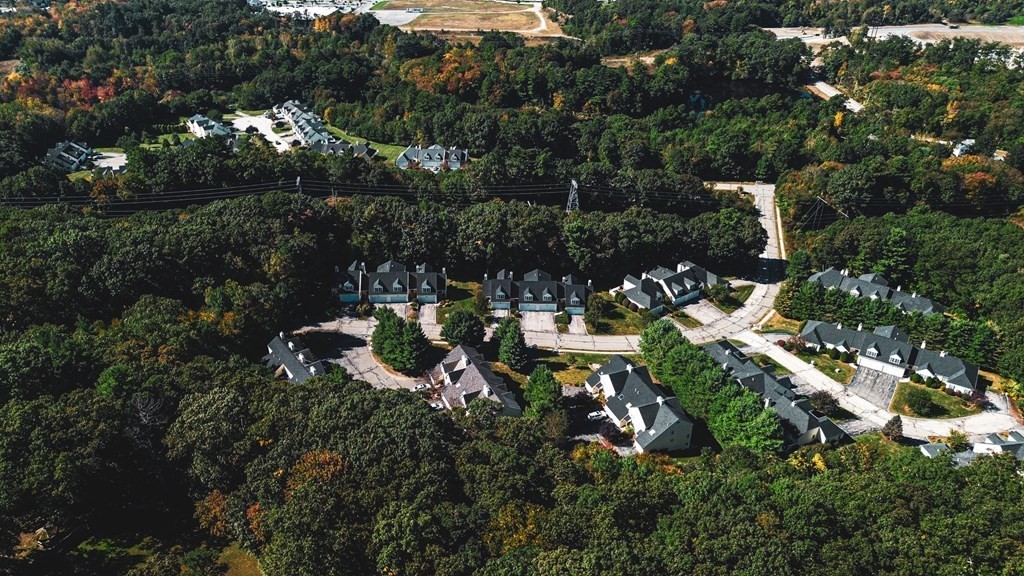19 Millers Way, Unit C Sutton, MA 01590 - Photo 37 of 37 an aerial view of residential house with outdoor space and trees all around