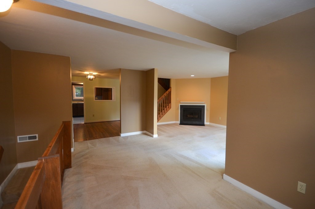 19 Millers Way, Unit C Sutton, MA 01590 - Photo 4 of 37 a view of a livingroom with a fireplace