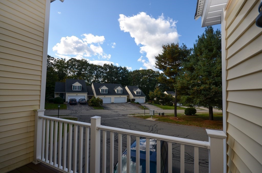 19 Millers Way, Unit C Sutton, MA 01590 - Photo 7 of 37 a view of a house with backyard from a balcony