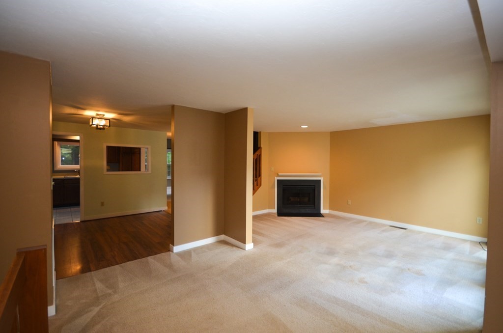 19 Millers Way, Unit C Sutton, MA 01590 - Photo 8 of 37 a view of an empty room with kitchen