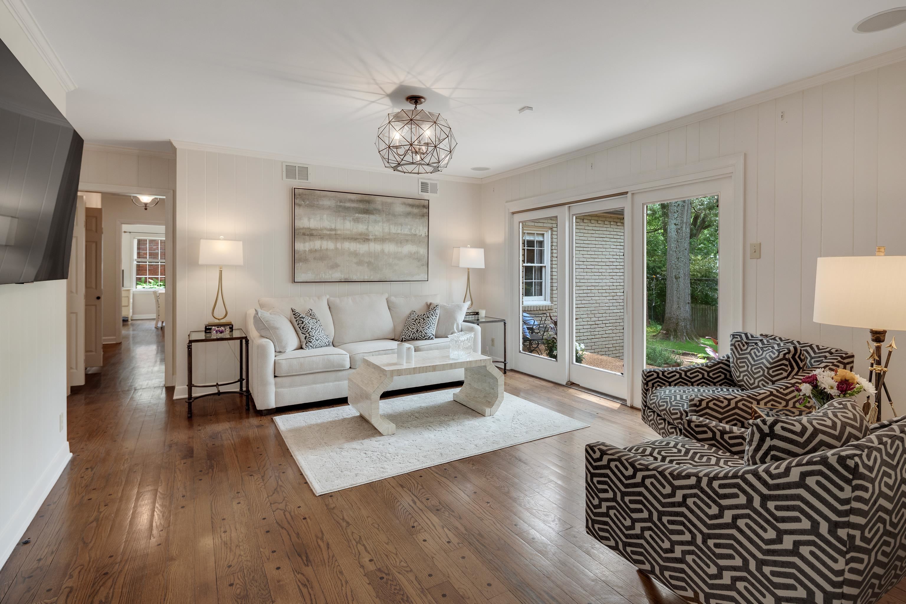 5371 South Angela Road Memphis, TN 38120 - Photo 12 of 25 a living room with furniture or couch and a wooden floor